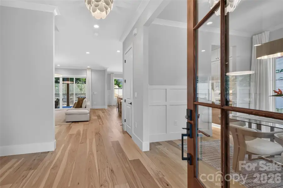 Welcome Home! Wait until you see this 7.25" Hickory plank flooring in person- just gorgeous!