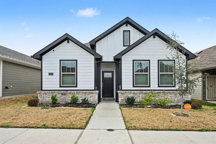 Front exterior of a new home in Palmilla Springs - Classic Series, Fort Worth, TX, highlighting curb appeal (Image 24).