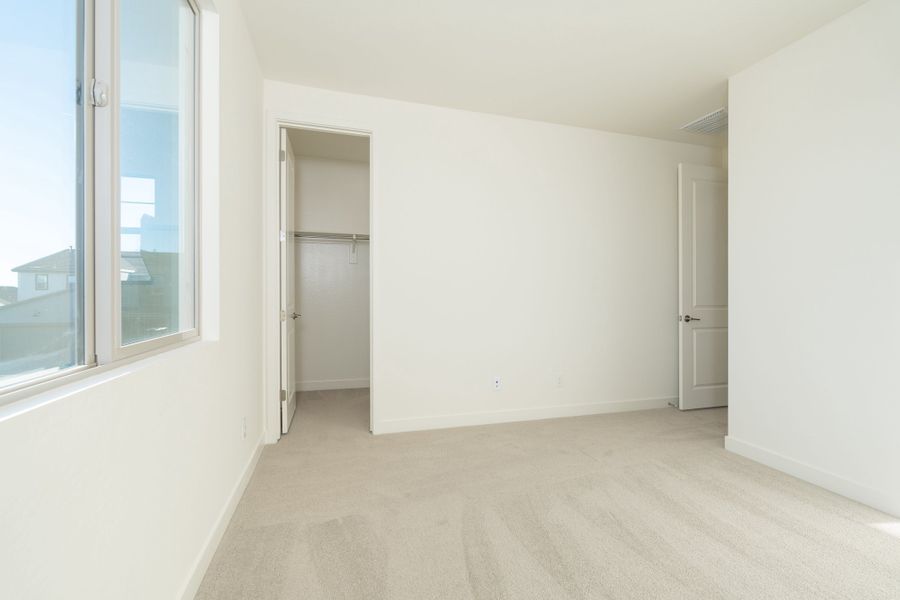 Spacious, unfurnished interior of a new home in Soleo, San Tan Valley (Image 13).