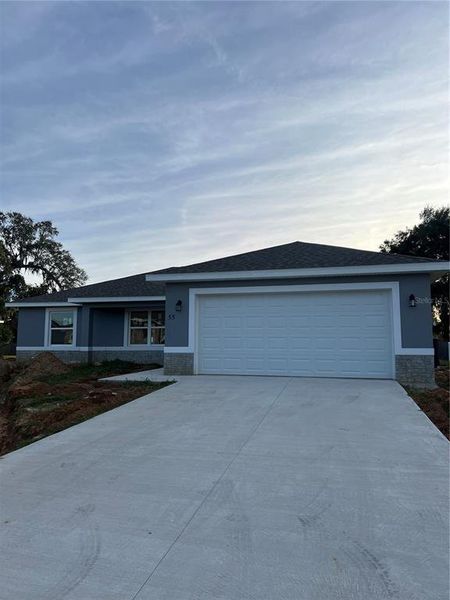 Front exterior of a new home in , Ocala, FL, highlighting curb appeal (Image 1). Front exterior of a new home in , Ocala, FL, highlighting curb appeal (Image 1).