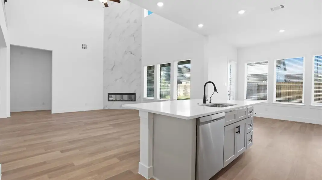 Representative furnished interior of a home built from the Adrian by D.R. Horton in Alexander 65' Homesites, Pearland (Image 9).