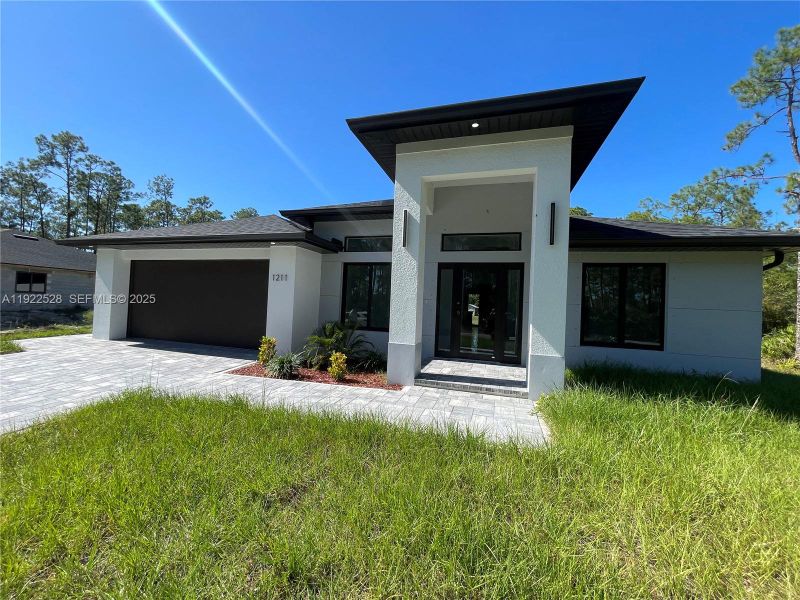 Exterior details and patio area of a home in , Lehigh Acres (Image 27). Exterior details and patio area of a home in , Lehigh Acres (Image 27).