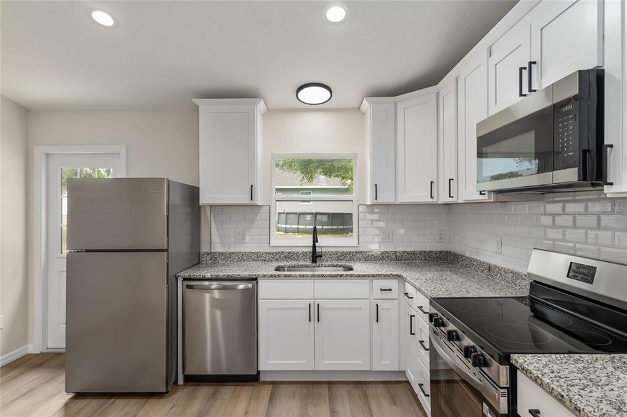 Furnished interior view inside a new home in , Dunnellon (Image 7).