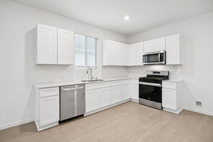 Furnished interior view inside a new home in Crosby Farms, Crosby (Image 13).