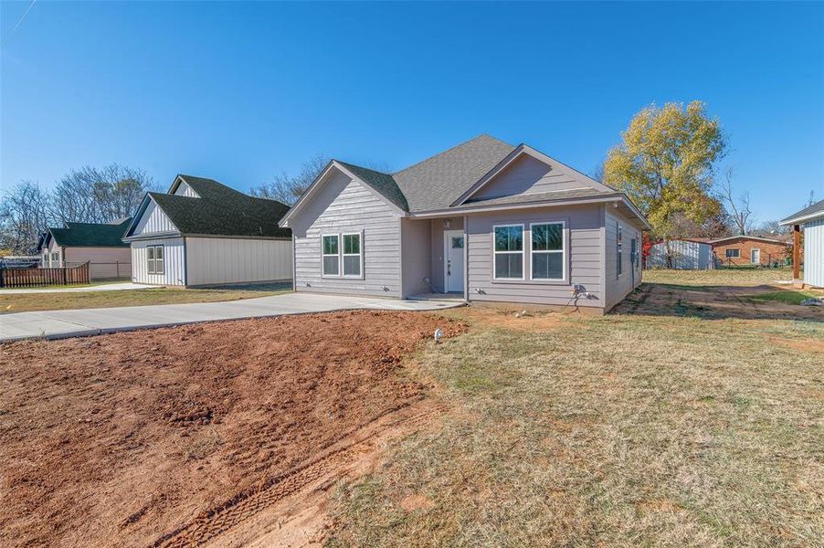 View of front of home featuring a front lawn View of front of home featuring a front lawn