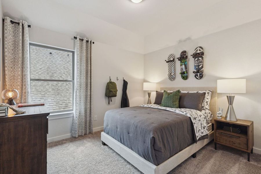 Bedroom in the Claret home plan by Trophy Signature Homes