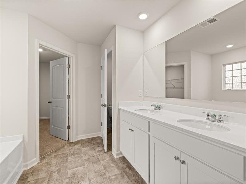 Furnished interior view inside a new home in Northwoods at Mirror Lake, Villa Rica (Image 12).
