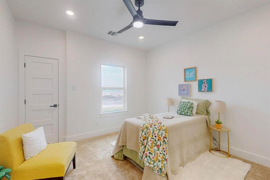 Bedroom featuring baseboards, carpet flooring, and recessed lighting Bedroom featuring baseboards, carpet flooring, and recessed lighting