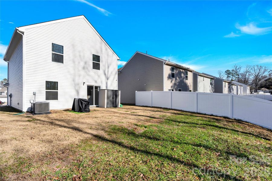Exterior details and patio area of a home in , Charlotte (Image 3).