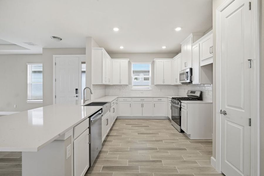 Furnished interior view inside a new home in Esplanade at Wiregrass Ranch, Wesley Chapel (Image 6).