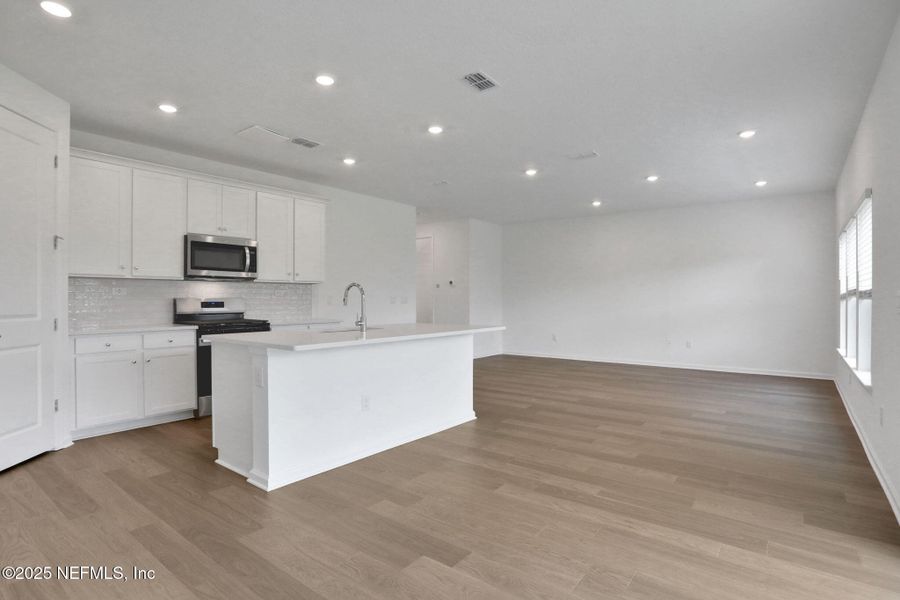 Furnished interior view inside a new home in TrailMark, St. Augustine (Image 12).