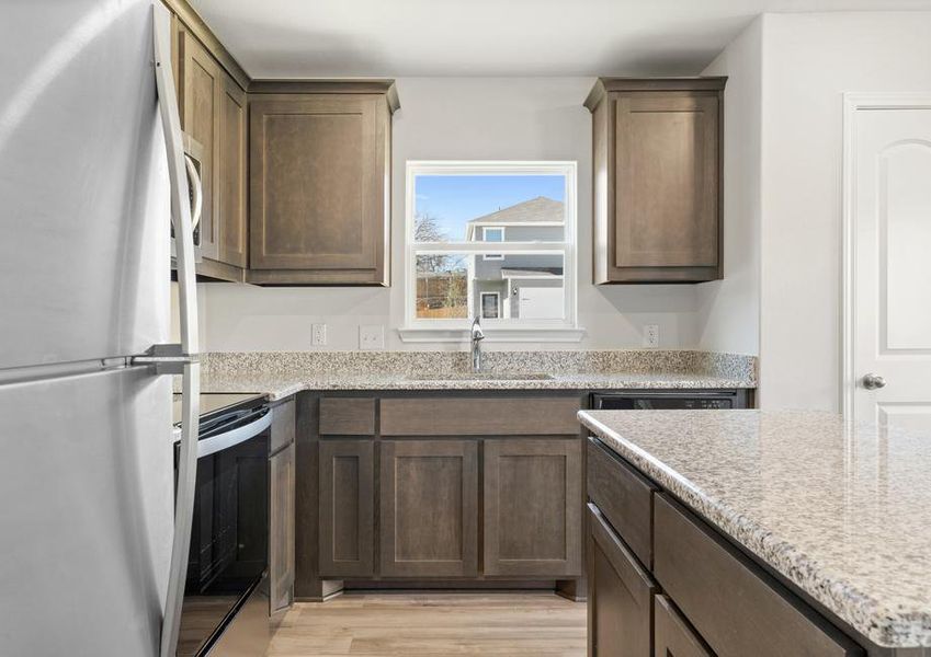 The kitchen of the Blanco has sprawling granite countertops.