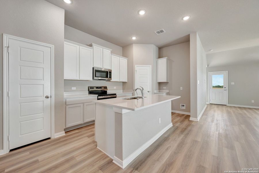 Furnished interior view inside a new home in Greenspoint Heights, Seguin (Image 5).