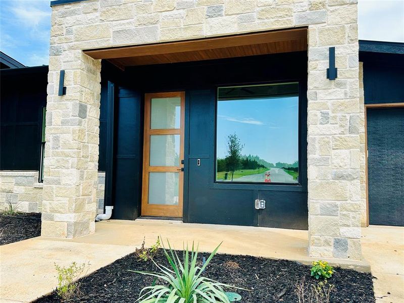 Front exterior of a new home in , Gordonville, TX, highlighting curb appeal (Image 21). Front exterior of a new home in , Gordonville, TX, highlighting curb appeal (Image 21).