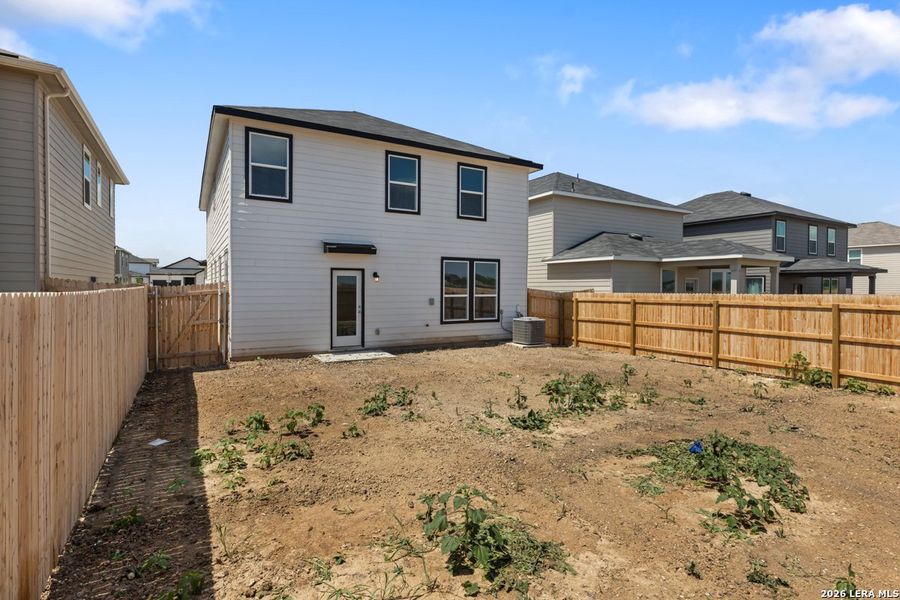 Exterior details and patio area of a home in Medina Crossing, Von Ormy (Image 4).