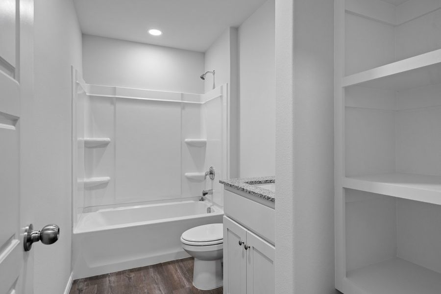 Representative furnished interior of a home built from the BELLVUE by D.R. Horton in Faculty Row, Abilene (Image 28).