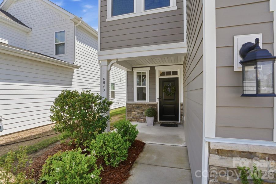 Exterior details and patio area of a home in , Charlotte (Image 24).