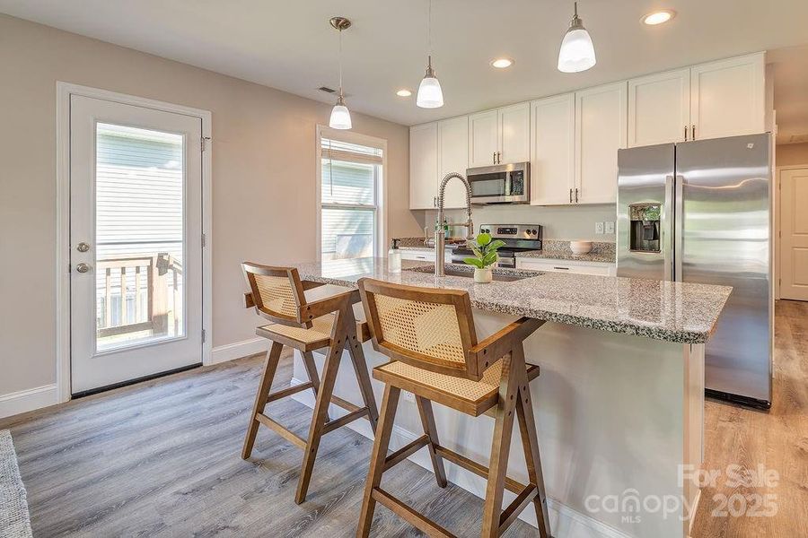 Furnished interior view inside a new home in , Black Mountain (Image 3).