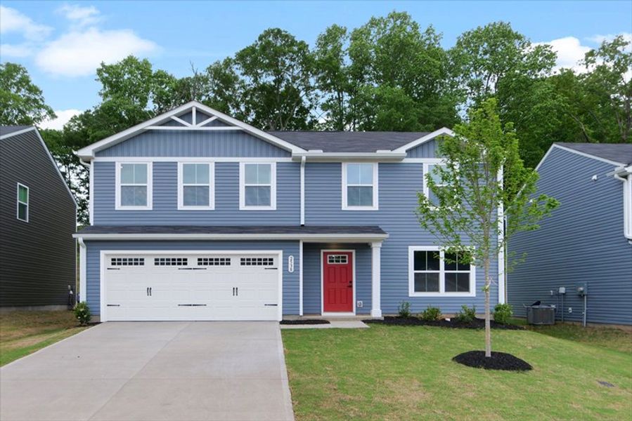 Front exterior of a new home in Quails Run, Lyman, SC, highlighting curb appeal (Image 1). Front exterior of a new home in Quails Run, Lyman, SC, highlighting curb appeal (Image 1).