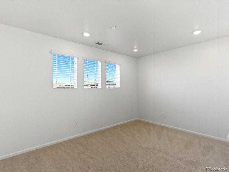 Spacious, unfurnished interior of a new home in Buffalo Highlands: The Flora Collection, Commerce City (Image 18).