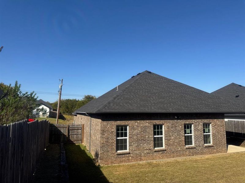 Exterior details and patio area of a home in , Granbury (Image 24). Exterior details and patio area of a home in , Granbury (Image 24).