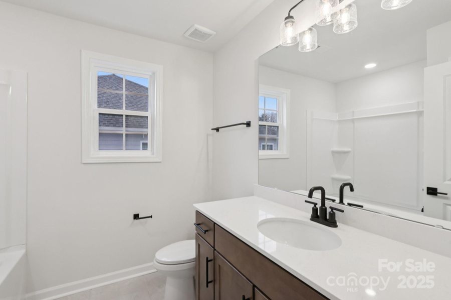 Furnished interior view inside a new home in Falls Cove, Troutman (Image 8).