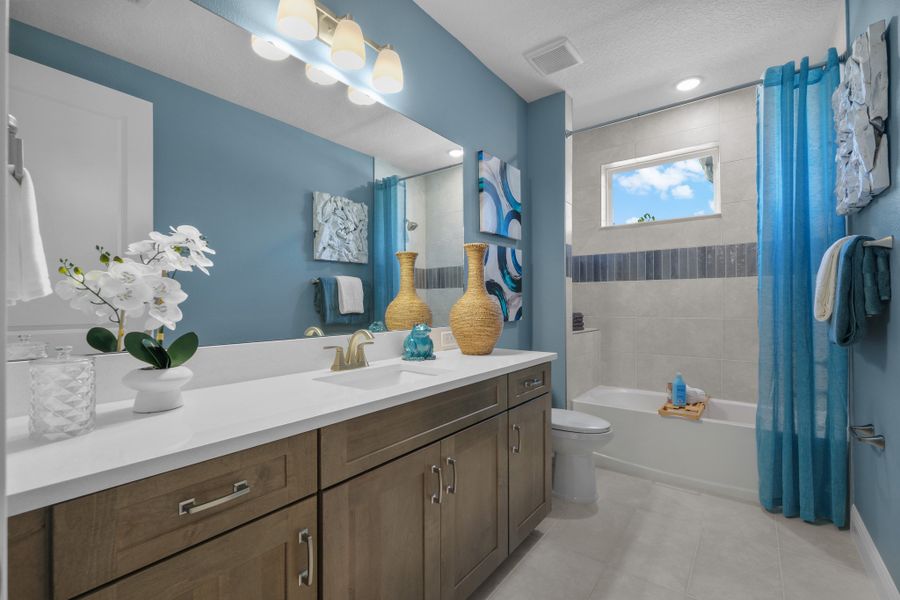 Representative furnished interior of a home built from the Lantana by Jones Homes USA in Ridgehaven, Ormond Beach (Image 16).