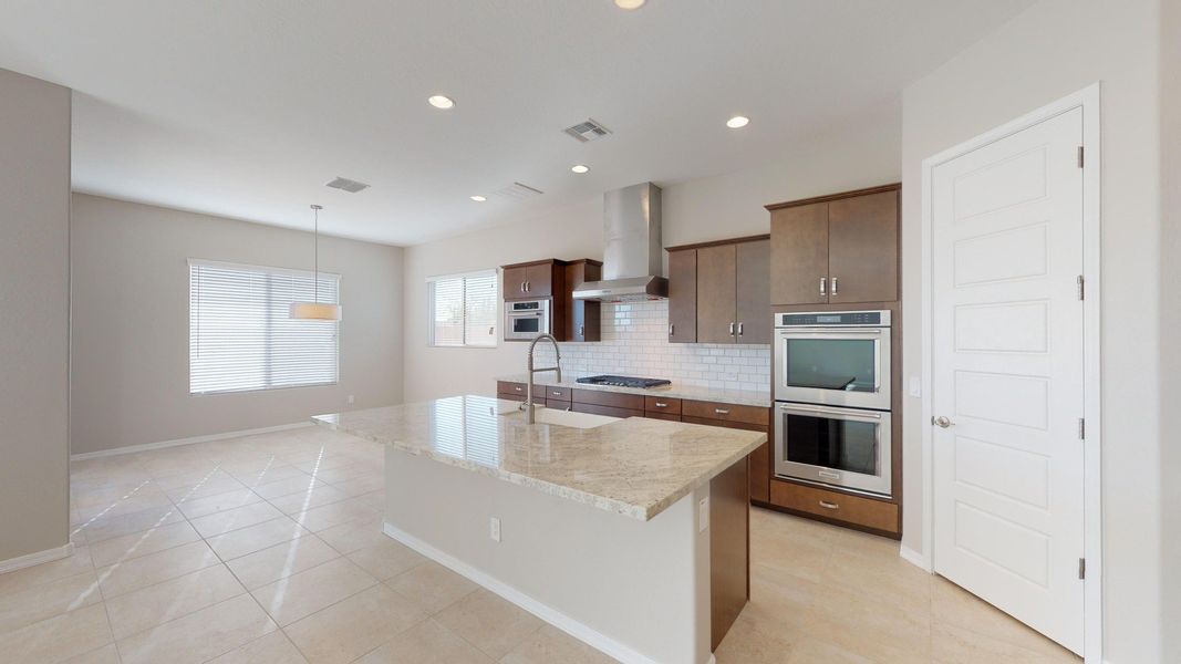 Representative furnished interior of a home built from the Benissa by DRB Homes in Windrose, Waddell (Image 5).