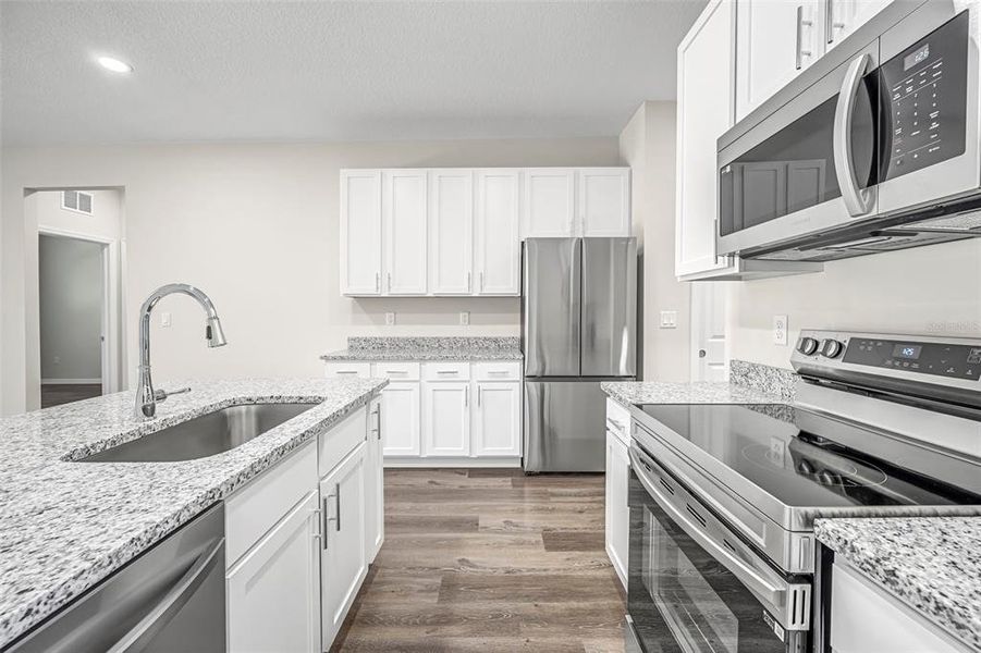 Furnished interior view inside a new home in , Weeki Wachee (Image 8).
