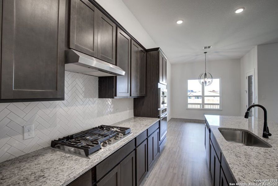 Furnished interior view inside a new home in The Reserve at Potranco Oaks, Castroville (Image 30).
