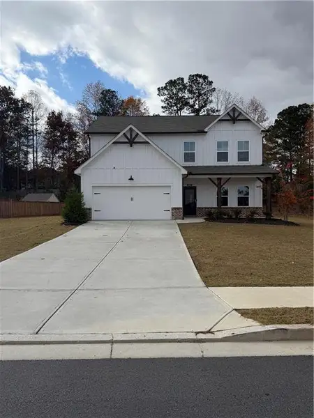 Front exterior of a new home in , Acworth, GA, highlighting curb appeal (Image 1).