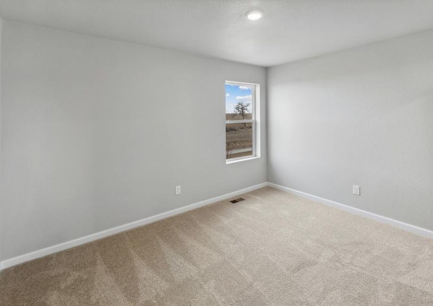 The second bedroom in the Yale floor plan is as a child's room or as a guest bedroom.