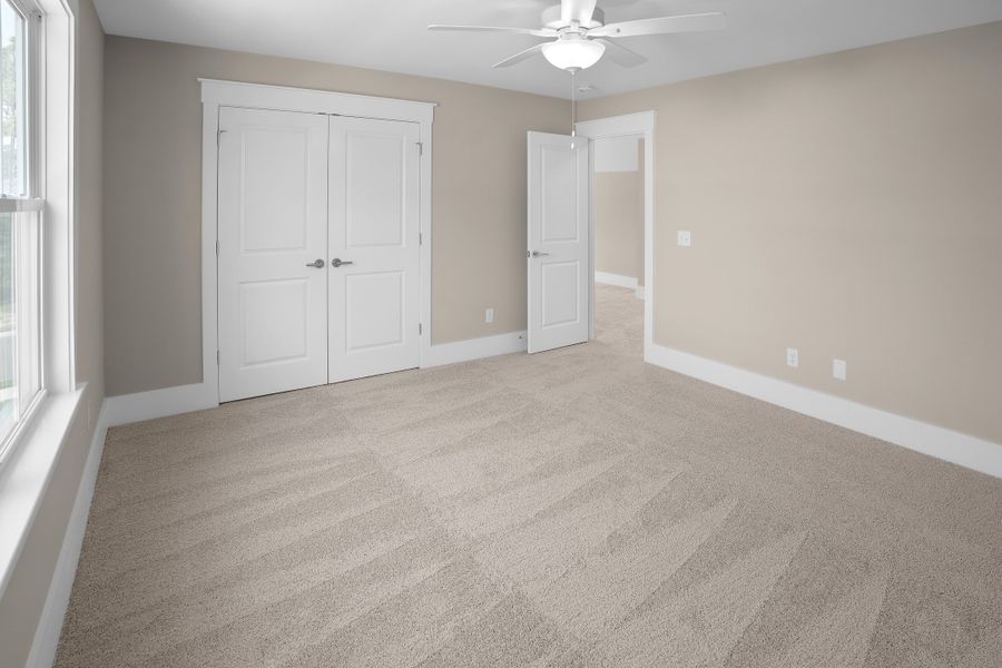 Spacious, unfurnished interior of a new home in Osprey Landing, Southport (Image 38).