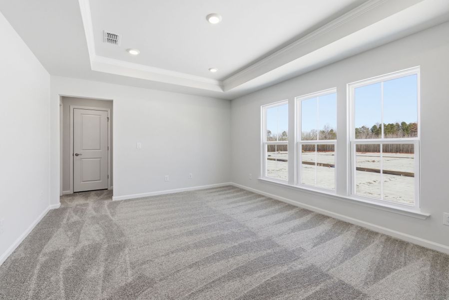 Spacious, unfurnished interior of a new home in Poets Walk, Whitsett (Image 17).