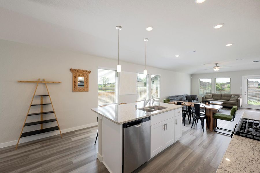 The focal point of the open living area is the large kitchen island with room for several people to watch you cook! The focal point of the open living area is the large kitchen island with room for several people to watch you cook!