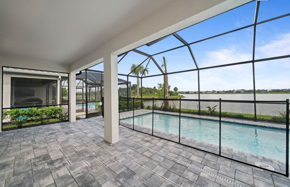 Exterior details and patio area of a home in Del Webb Oak Creek, North Fort Myers (Image 25).