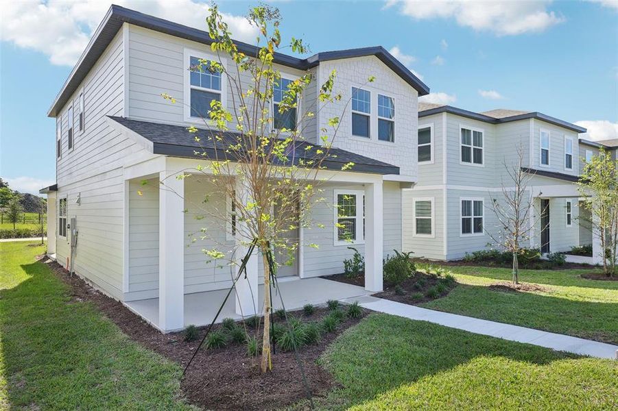 Front exterior of a home in the Ellington Classical community, located in St. Cloud, FL (Image 10).