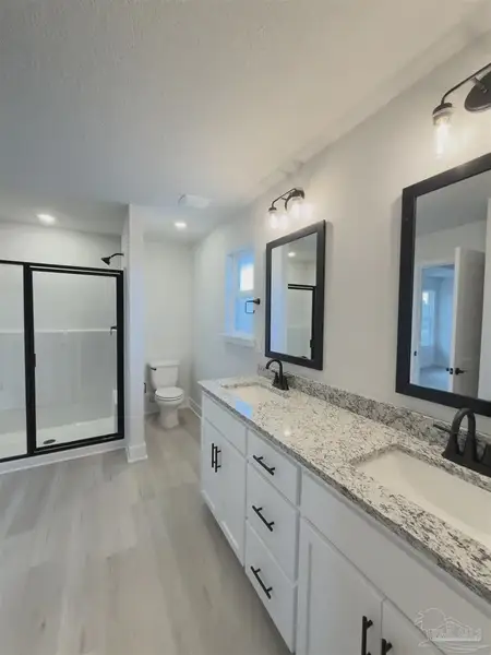 Furnished interior view inside a new home in Allison Acres, Cantonment (Image 7).