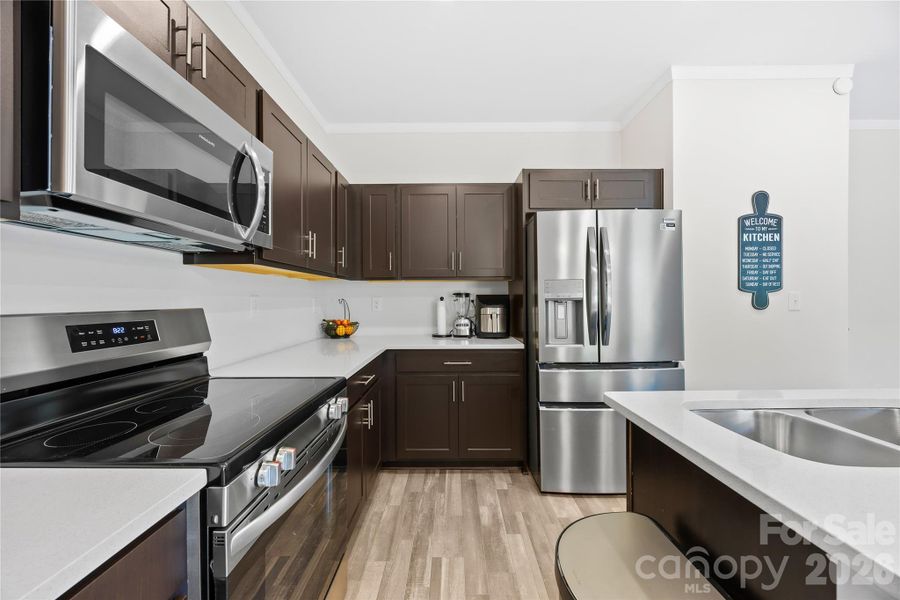 Furnished interior view inside a new home in Orchard Creek, Charlotte (Image 19).