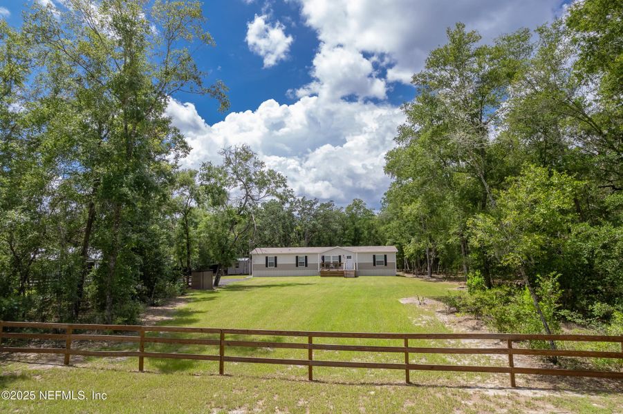 Front exterior of a new home in , Pomona Park, FL, highlighting curb appeal (Image 18).