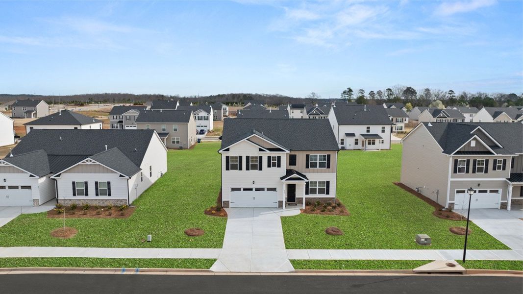 Front exterior of a new home in Estates at Deer Hollow, Grovetown, GA, highlighting curb appeal (Image 22).