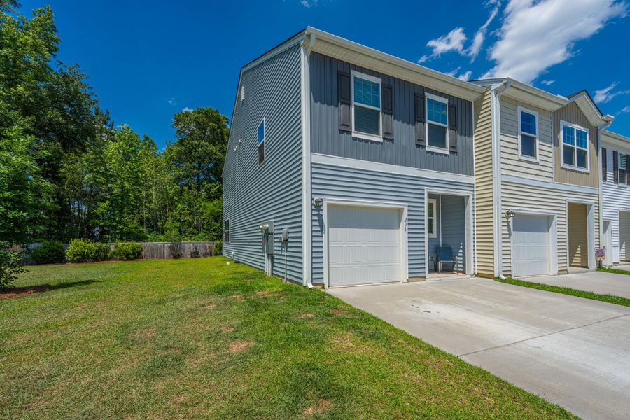 Front exterior of a new home in , Summerville, SC, highlighting curb appeal (Image 21).