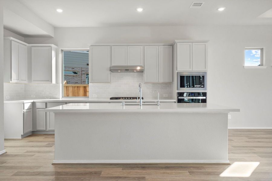 Furnished interior view inside a new home in Dunham Pointe 50', Cypress (Image 11).