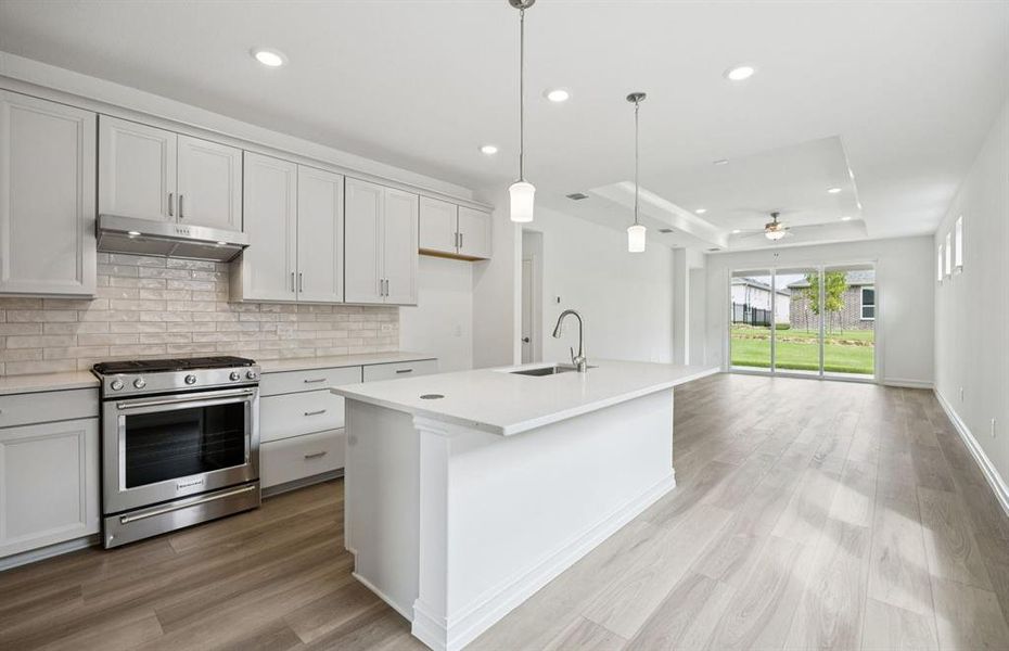 Spacious kitchen with access to backyard