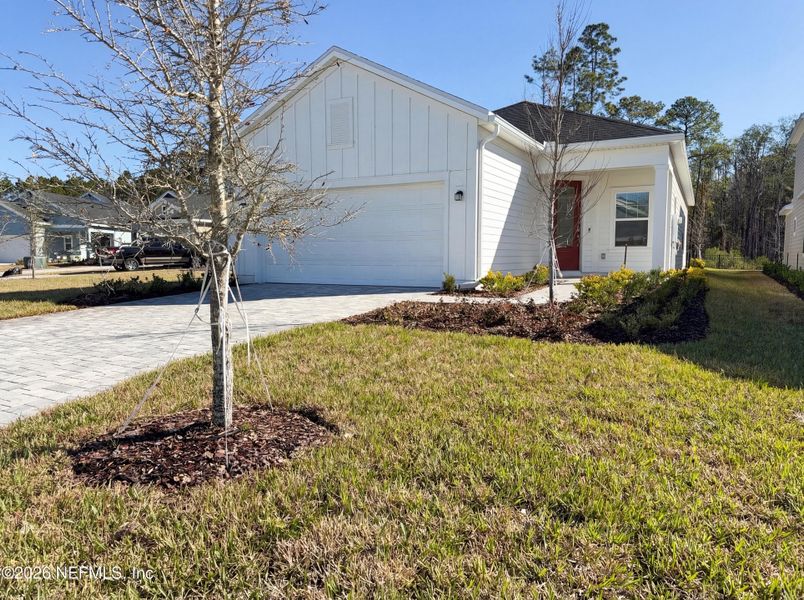 Front exterior of a new home in Stillwater | Active Adult 55+, St. Johns, FL, highlighting curb appeal (Image 2).