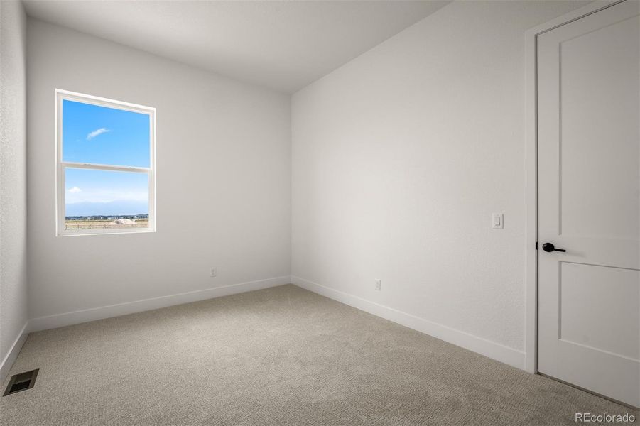 Spacious, unfurnished interior of a new home in Wolf Ranch - Enclave Collection, Colorado Springs (Image 18).