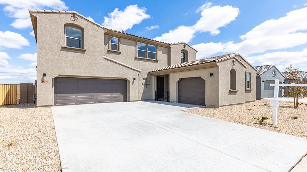 Representative exterior photo of a completed home built from the 45RM4 by Taylor Morrison in Almeria at Rancho Mercado, Surprise, AZ (Image 23).