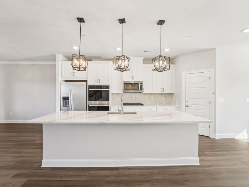 Furnished interior view inside a new home in Hemingway - Highland Series, Cumming (Image 6).