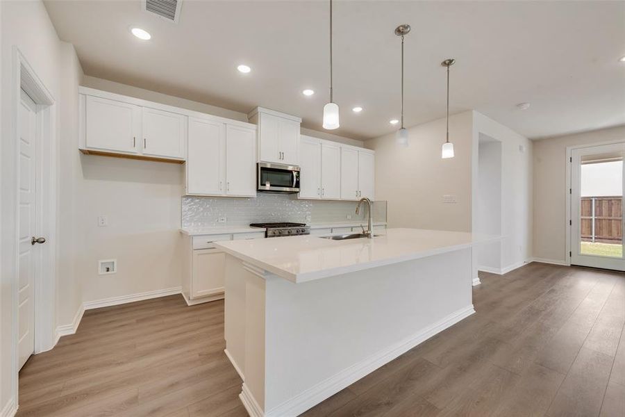 Furnished interior view inside a new home in Spiritas Ranch, Little Elm (Image 8). Furnished interior view inside a new home in Spiritas Ranch, Little Elm (Image 8).