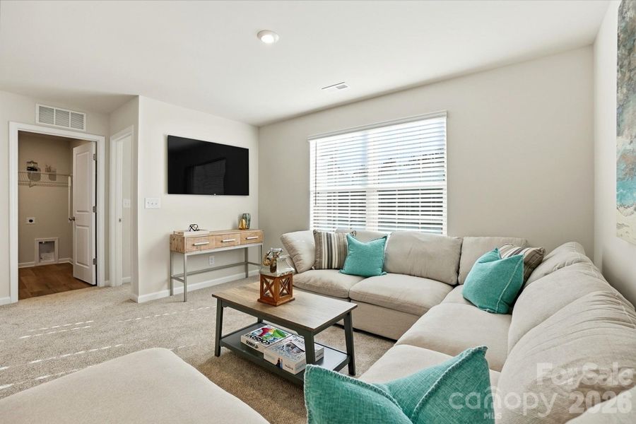 Furnished interior view inside a new home in Waxhaw Landing, Monroe (Image 10).